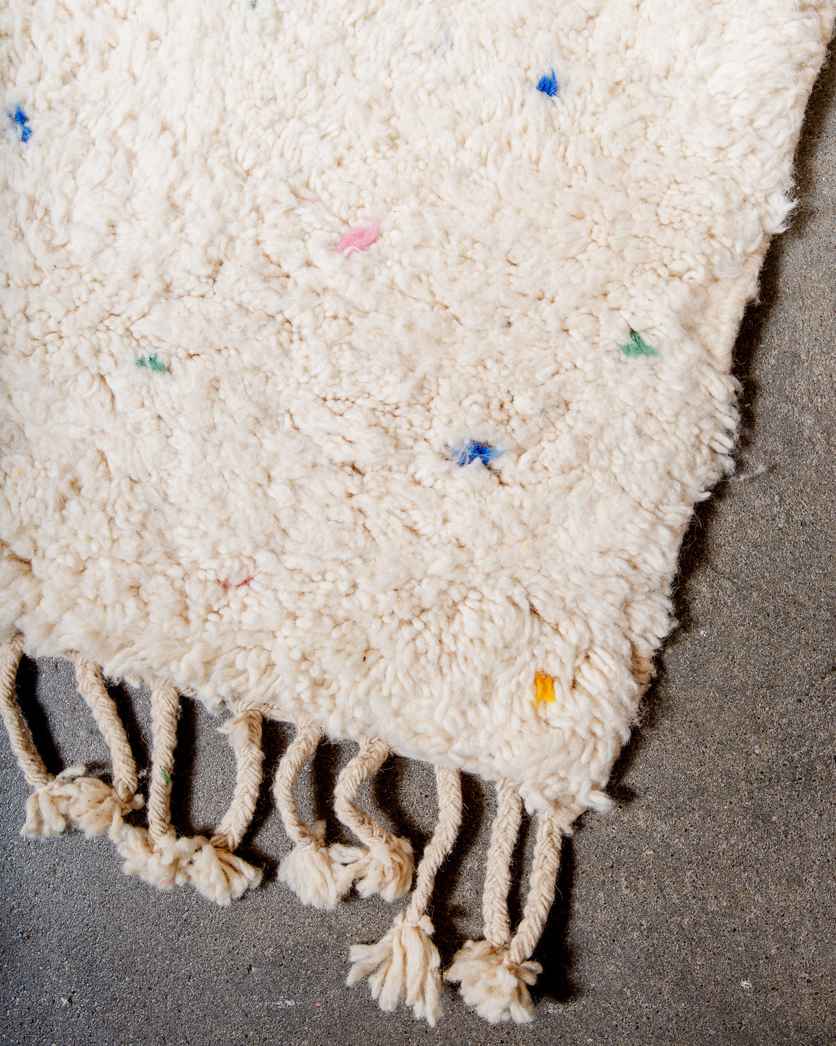 Modern, designer, handcrafted Berber rug from Morocco. Beniourain carpet with beautiful colours and patterns and fluffy wool texture.